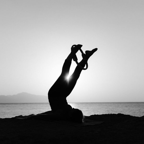 Silhouette of a person in a yoga pose